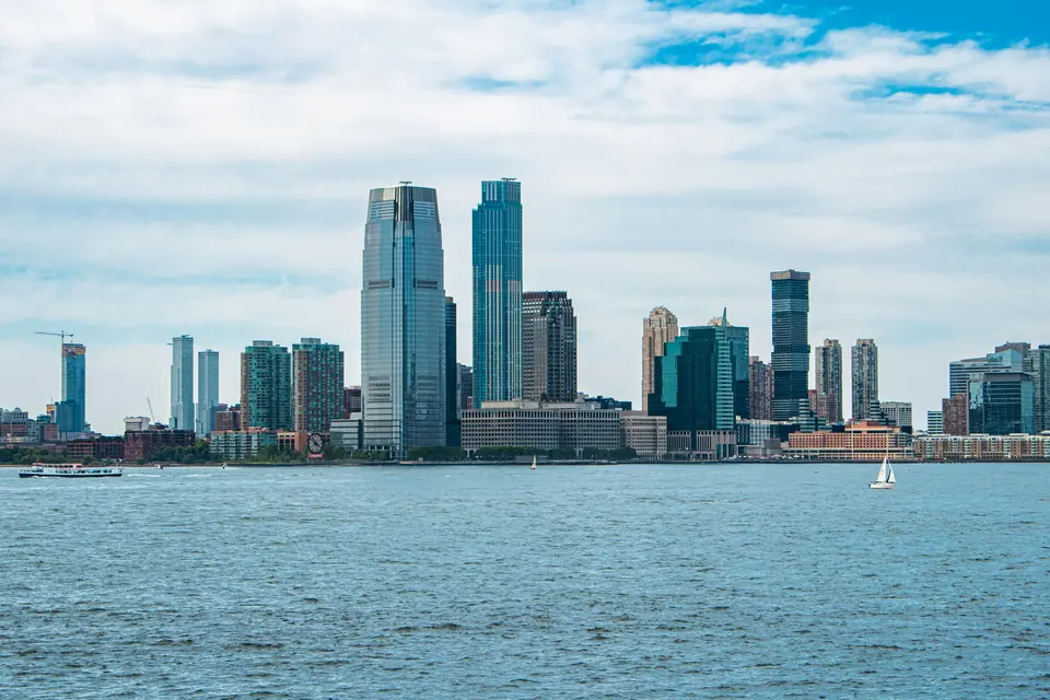 The Jersey City skyline on the Hudson River at dusk